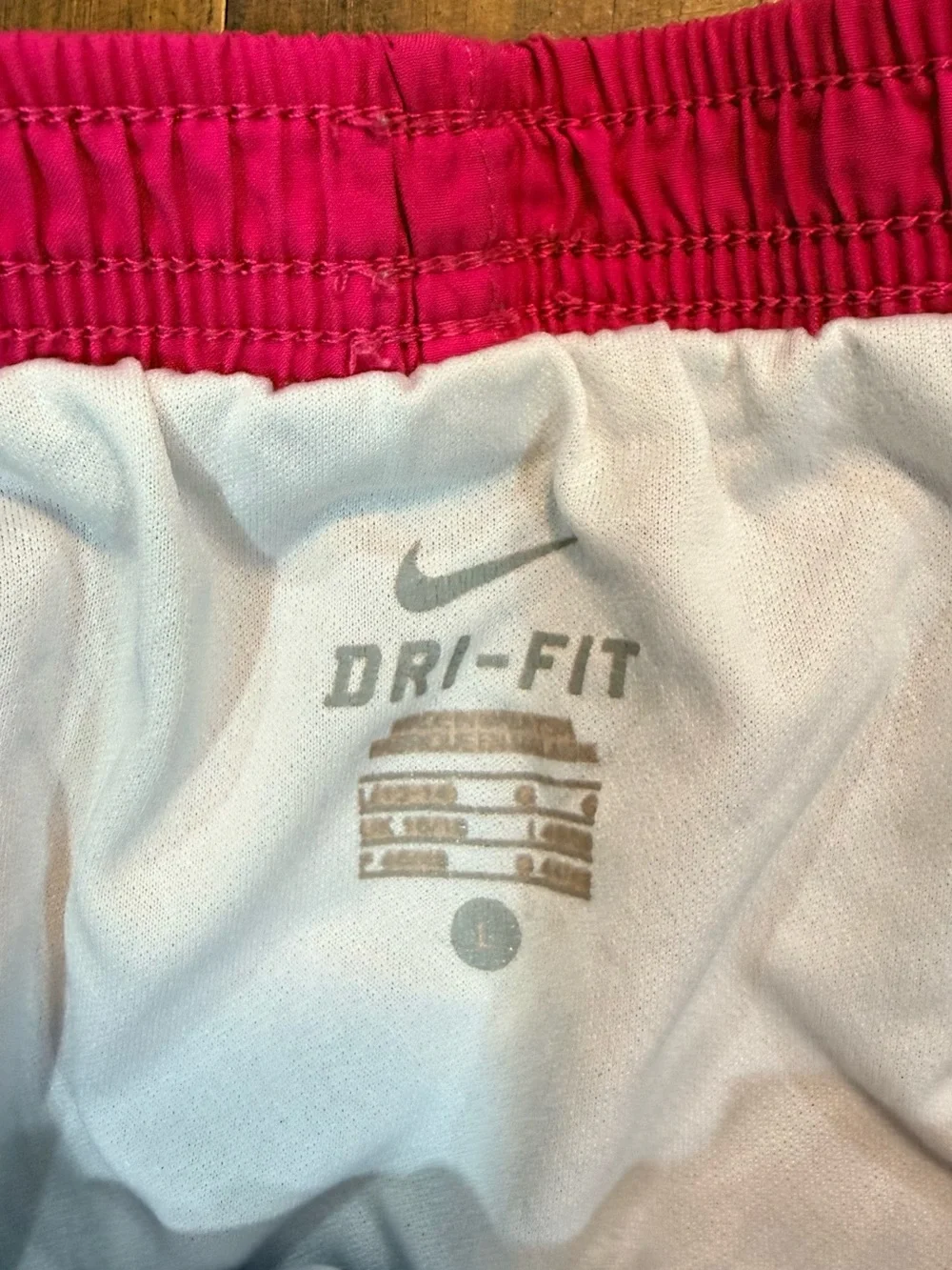 Nike Women’s Bright Pink Athletic Shorts with Blue Trim